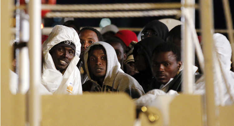 Migrants on a refugee vessel.